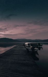 Preview wallpaper pier, boat, sunset, sea, sky