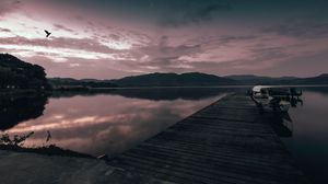 Preview wallpaper pier, boat, sunset, sea, sky