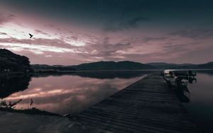 Preview wallpaper pier, boat, sunset, sea, sky