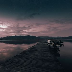 Preview wallpaper pier, boat, sunset, sea, sky