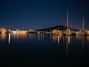 Preview wallpaper pier, boats, lake, reflection, night