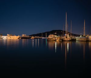 Preview wallpaper pier, boats, lake, reflection, night