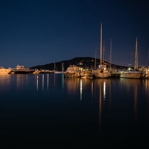 Preview wallpaper pier, boats, lake, reflection, night