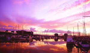 Preview wallpaper pier, boats, sky, sunset, sea