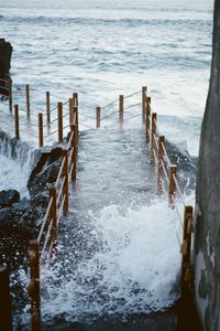 Preview wallpaper pier, bridge, surf, wave, sea