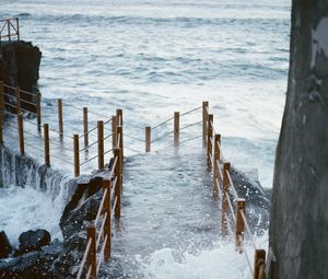 Preview wallpaper pier, bridge, surf, wave, sea