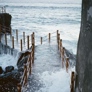 Preview wallpaper pier, bridge, surf, wave, sea