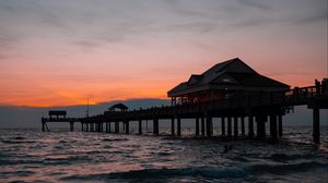 Preview wallpaper pier, building, sea, dusk