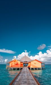 Preview wallpaper pier, buildings, ocean, coast, tropics