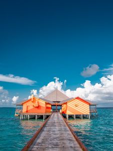 Preview wallpaper pier, buildings, ocean, coast, tropics
