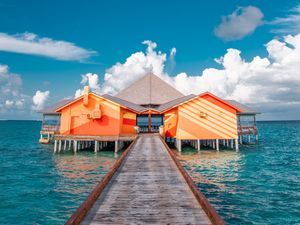 Preview wallpaper pier, buildings, ocean, coast, tropics