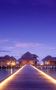 Preview wallpaper pier, bungalow, buildings, backlight, ocean