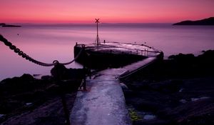 Preview wallpaper pier, chain, sea, evening, sign