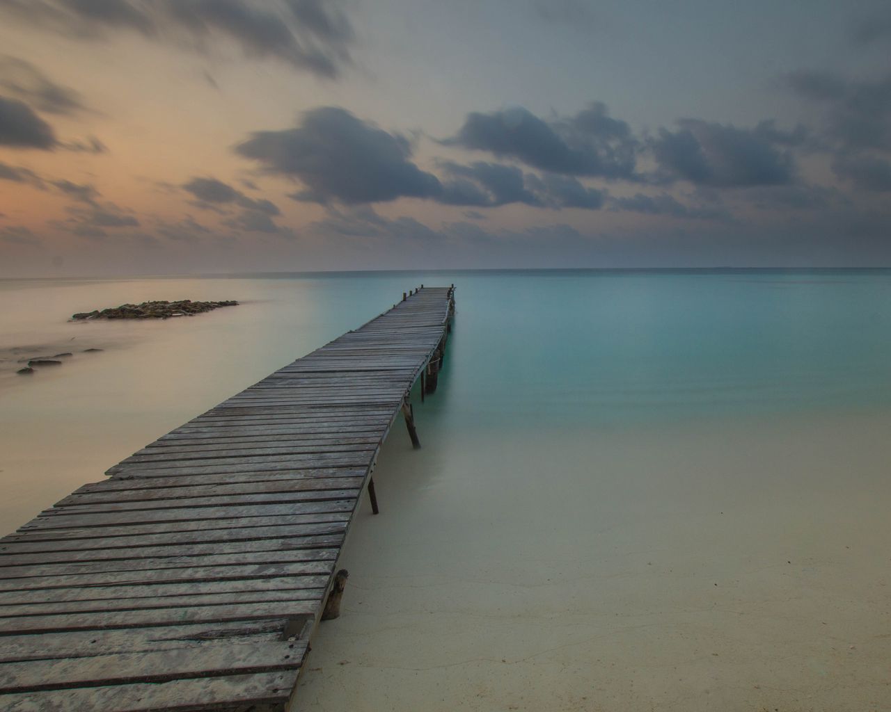 Download wallpaper 1280x1024 pier, coast, sand, horizon, clouds ...