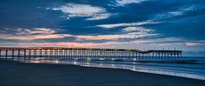 Preview wallpaper pier, coast, sand, horizon, sea