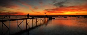 Preview wallpaper pier, couple, silhouettes, sea, evening