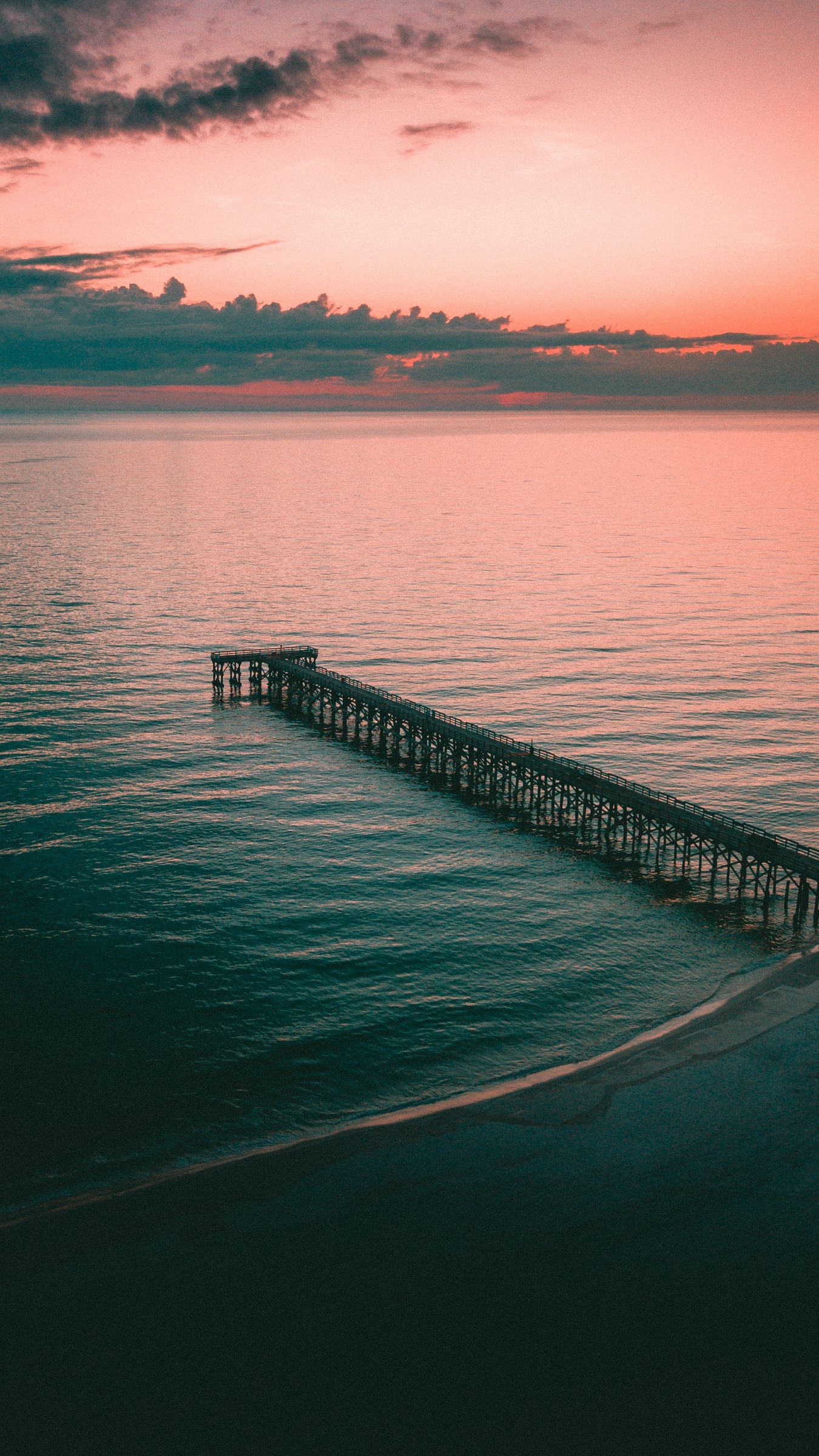 Download wallpaper 1350x2400 pier, dock, sea, dusk, shore iphone 8+/7