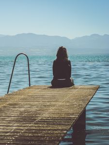 Preview wallpaper pier, girl, sea, solitude