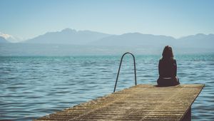 Preview wallpaper pier, girl, sea, solitude