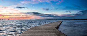 Preview wallpaper pier, horizon, sunset, water, wooden