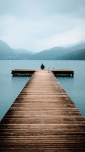 Preview wallpaper pier, lake, loneliness, fog, man