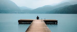 Preview wallpaper pier, lake, loneliness, fog, man