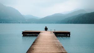 Preview wallpaper pier, lake, loneliness, fog, man