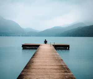 Preview wallpaper pier, lake, loneliness, fog, man