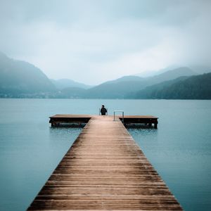 Preview wallpaper pier, lake, loneliness, fog, man