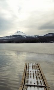 Preview wallpaper pier, lake, mountain, landscape, snow, winter