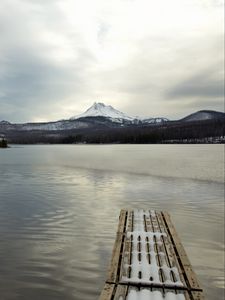 Preview wallpaper pier, lake, mountain, landscape, snow, winter