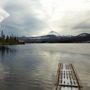 Preview wallpaper pier, lake, mountain, landscape, snow, winter