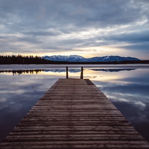 Preview wallpaper pier, lake, mountains, clouds, reflection