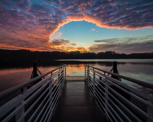 Preview wallpaper pier, lake, sunset, clouds, idyll