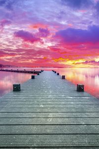 Preview wallpaper pier, lake, sunset, sky, nature