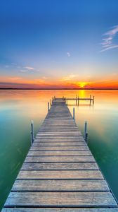 Preview wallpaper pier, lake, sunset, water, horizon