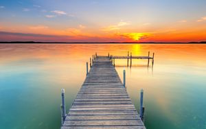 Preview wallpaper pier, lake, sunset, water, horizon