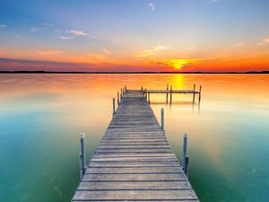 Preview wallpaper pier, lake, sunset, water, horizon