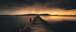 Preview wallpaper pier, lake, sunset, dusk, water