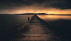 Preview wallpaper pier, lake, sunset, dusk, water