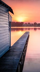 Preview wallpaper pier, lake, water, sun, sunset