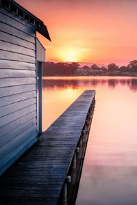 Preview wallpaper pier, lake, water, sun, sunset