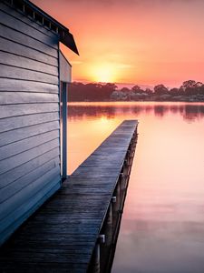 Preview wallpaper pier, lake, water, sun, sunset