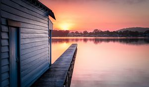 Preview wallpaper pier, lake, water, sun, sunset