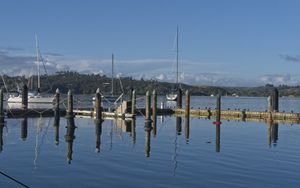 Preview wallpaper pier, lake, yachts, piles