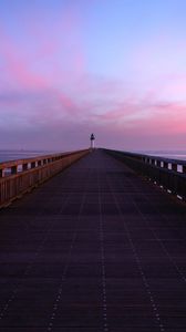 Preview wallpaper pier, lighthouse, horizon, dawn, sea, sky