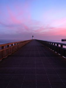 Preview wallpaper pier, lighthouse, horizon, dawn, sea, sky