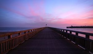 Preview wallpaper pier, lighthouse, horizon, dawn, sea, sky