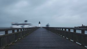 Preview wallpaper pier, lighthouse, motion, long exposure