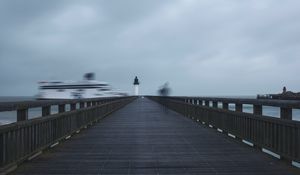 Preview wallpaper pier, lighthouse, motion, long exposure